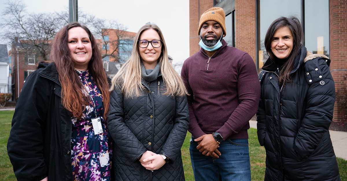 New county hires standing in from of the Administration Building in Doylestown