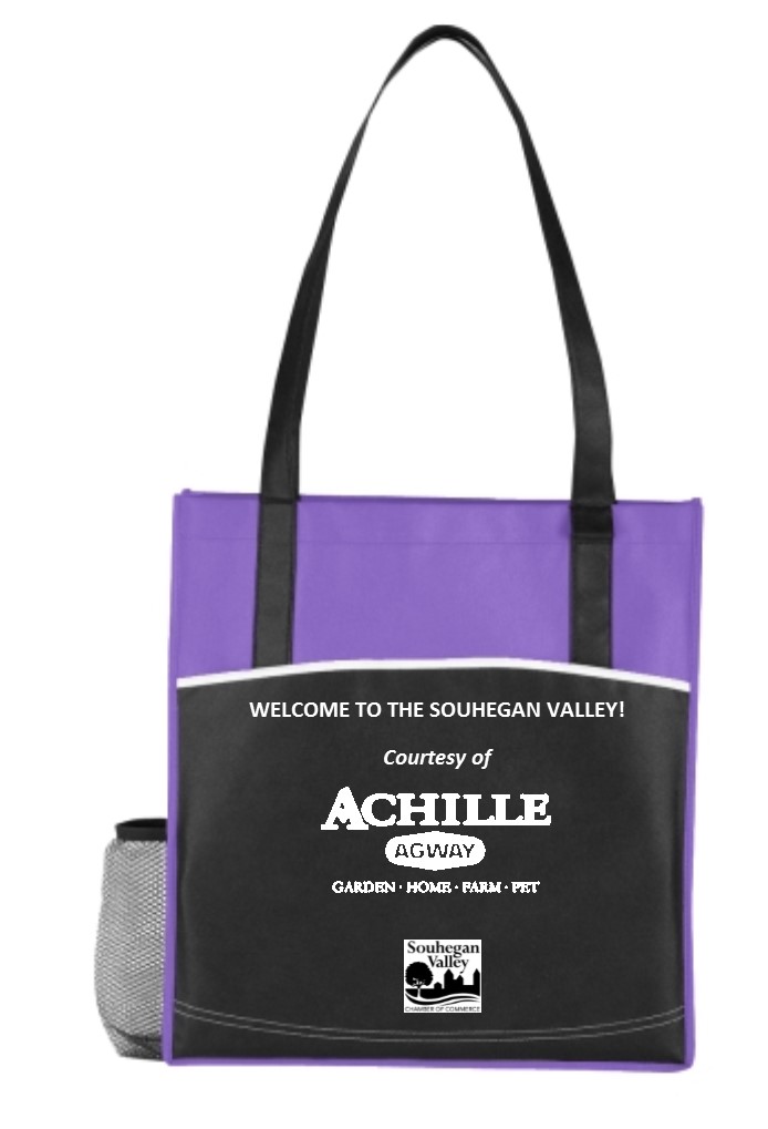 Welcome Bags provided by the Chamber are handed out to realtors and others.