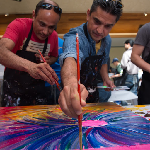 A Communication and Collaboration event painting abstract flower.