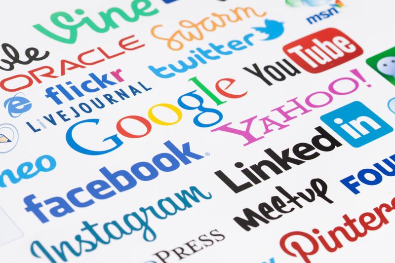 KIEV, UKRAINE - OKTOBER 03, 2015 Collection of inscriptions, symbols of popular social media Youhoo, Google, Instagram, Flickr, Linkedin, Facebook, Flickr, YouTube, Twitter, Pinterest and others printed on paper. Selective focus