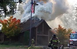 smoke coming out of church building