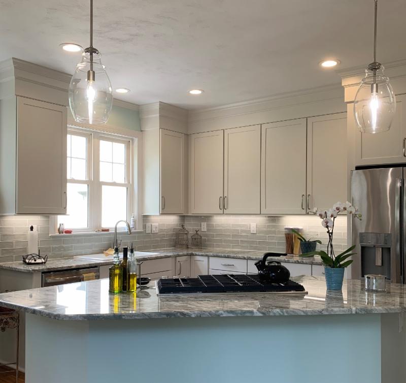 Horton Kitchen After Remodel White Cabinets Glass Subway Tile Backsplash Fantasy Brown Granite Countertops