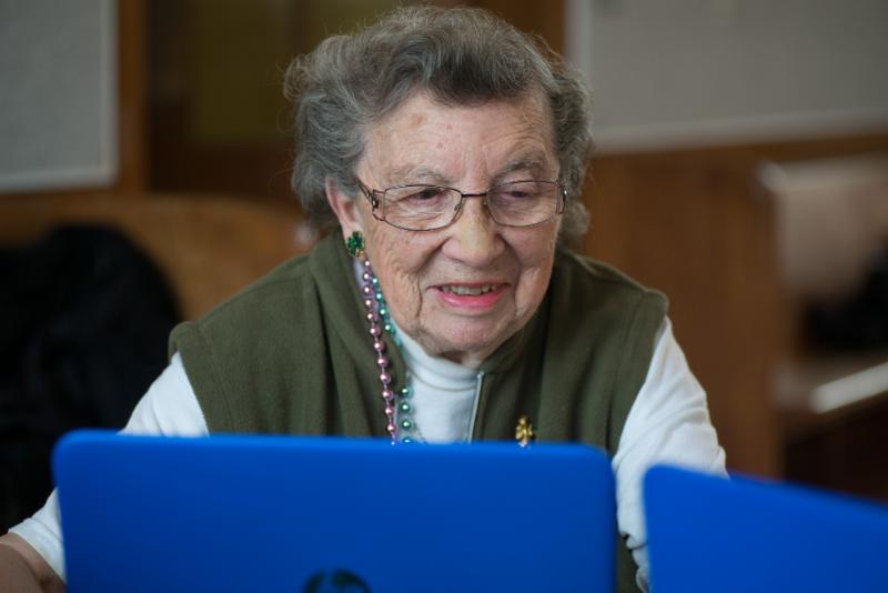smiling senior at our mobile lab