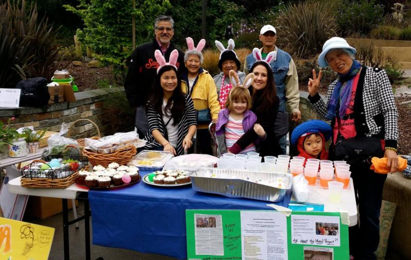 Supervisor Avalos with kids and seniors at a bake sale