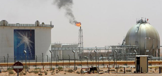 A gas flame is seen in the desert near the Khurais oilfield in Saudi Arabia.